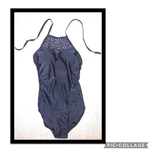 Super cute, shape flattering swimsuit! Like new!